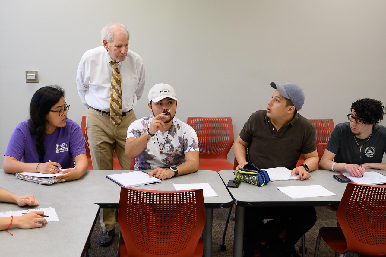 Professor Uri Treisman working with a small group of students