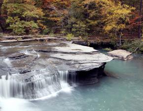 Haw Creek waterfall during peak autumn/fall colors in Pelsor, Arkansa.