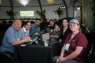 six participants of a professional development session at a table