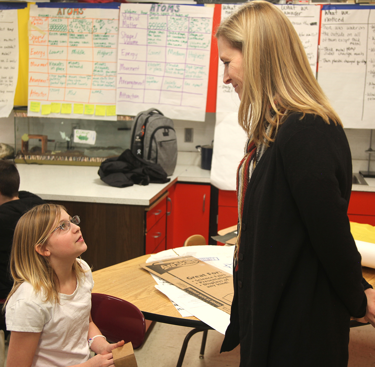 Shelly LeDoux working with a student in an Iowa classroom.
