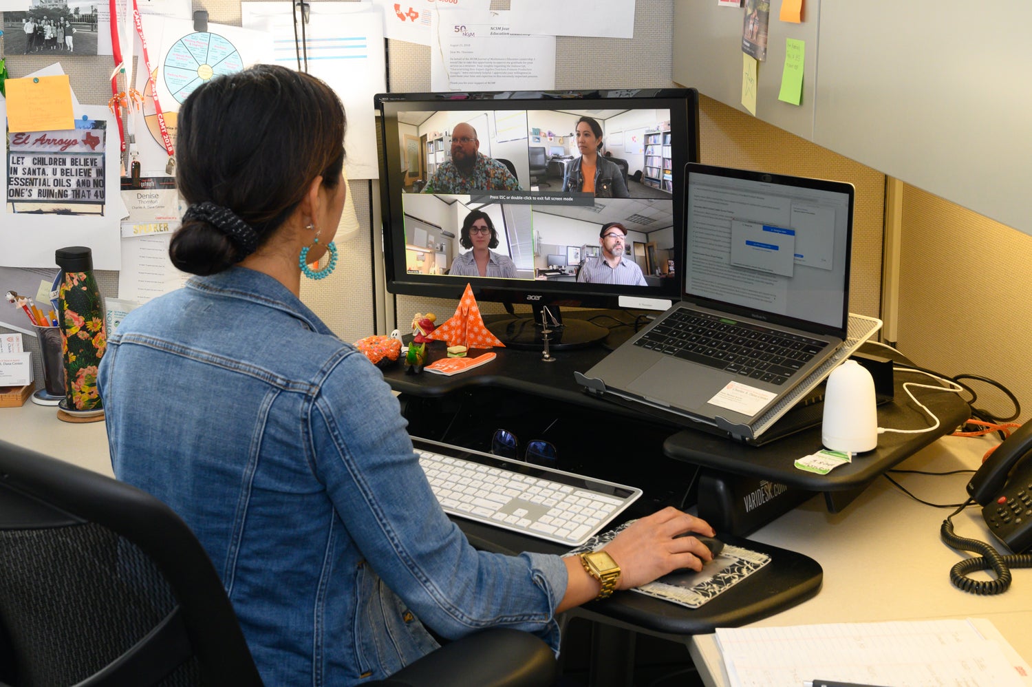 woman at a computer on a virtual learning session