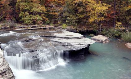 Haw Creek waterfall during peak autumn/fall colors in Pelsor, Arkansa.