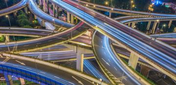 Highway interchanges at night.