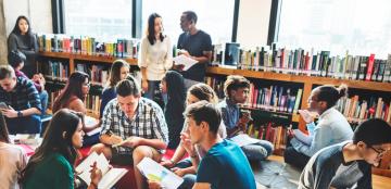 students congregating in library