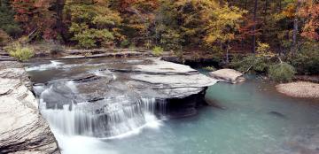 Haw Creek waterfall during peak autumn/fall colors in Pelsor, Arkansa.