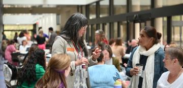 Tammi Perez-Rice speaks with women during a convening around corequisites