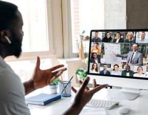 person participating in web conference meeting