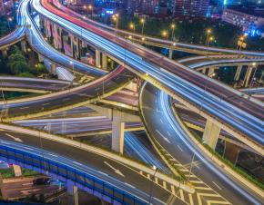 Highway interchanges at night.