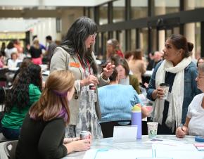 Tammi Perez-Rice speaks with women during a convening around corequisites
