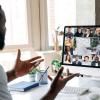 person participating in web conference meeting